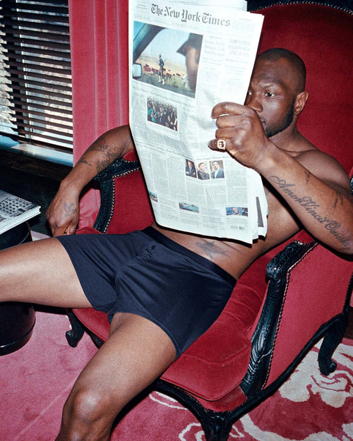 Marcus reading the newspaper wearing Lyocell Boxer Shorts Navy blue