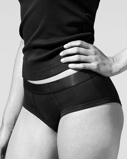 Model dressed in black underwear from cdlp