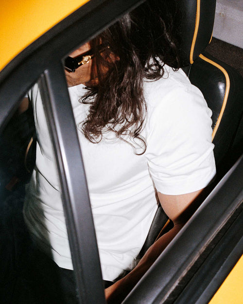 Oskar wears Midweight T-Shirt in White