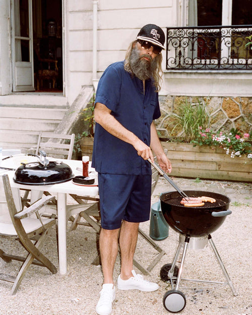Sébastien grills wearing Home Shirt Short-Sleeve in Navy Blue